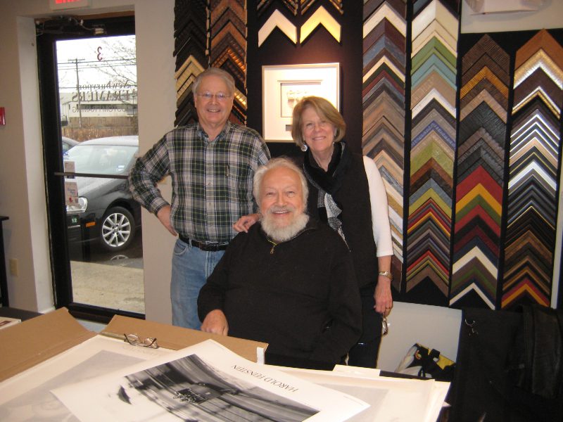 Signing posters at the Newburyport Framers with owners Larry and Sherry Pearl