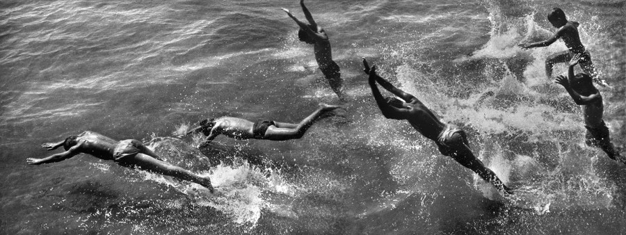 Boys diving into surf, 1954
