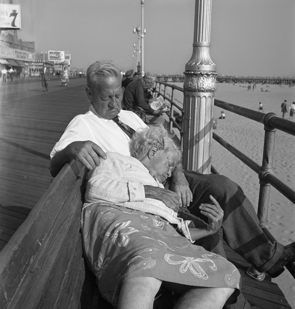 Asleep on boardwalk bench, 1947
