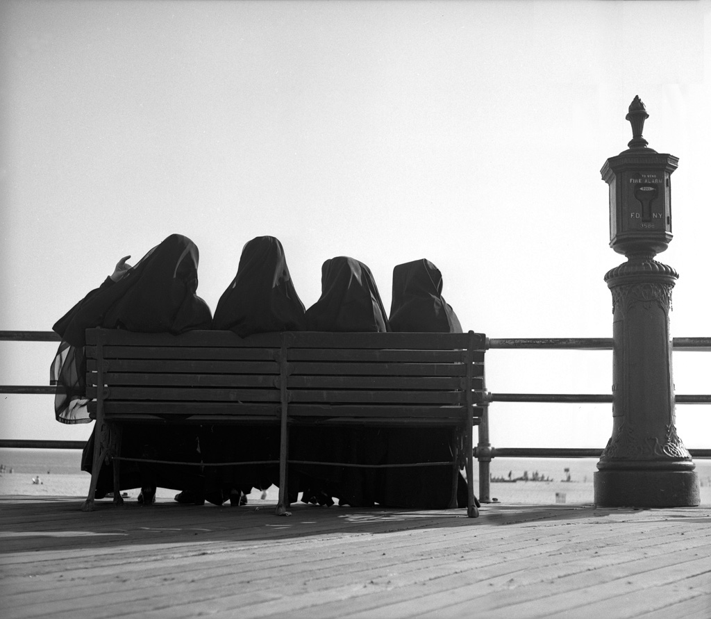 Nuns in habits on boardwalk, 1949