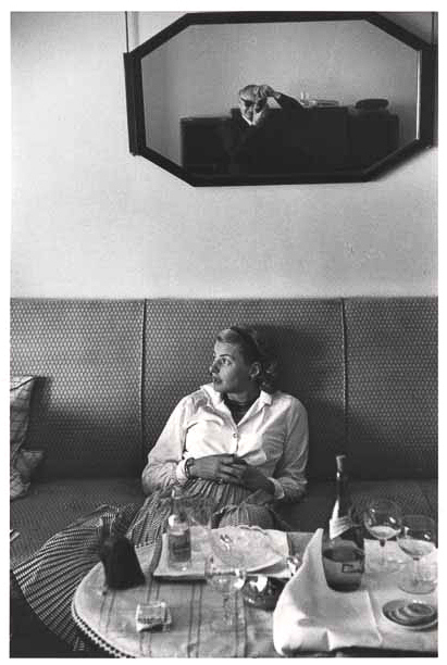 Ingrid Bergman on sofa with David Seymour, 1956