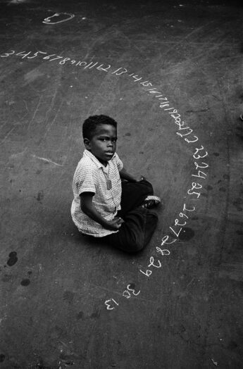 Boy with Chalked Numbers, NYC, 1956