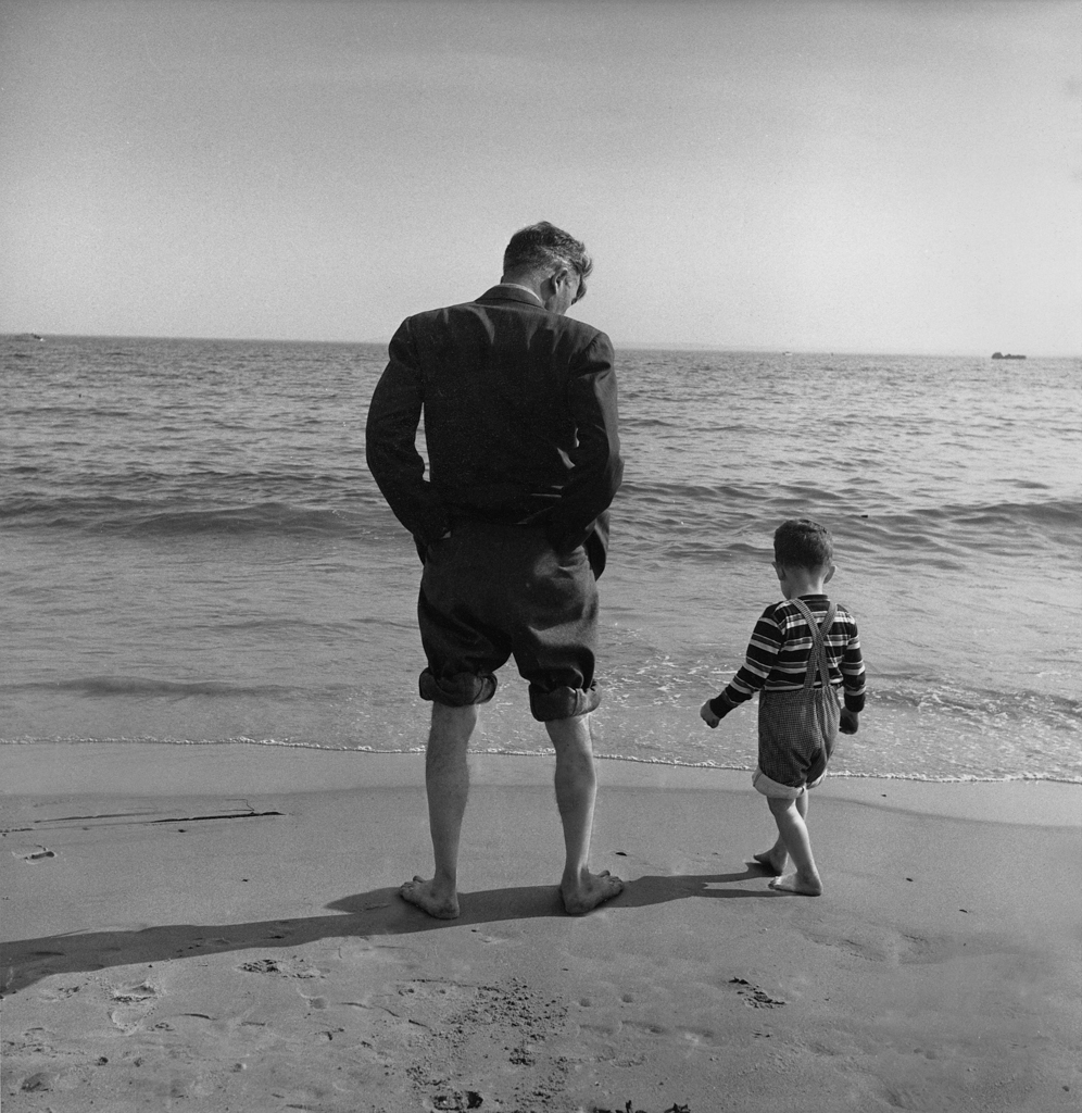 Father and son by waters edge, Coney Island, 1948