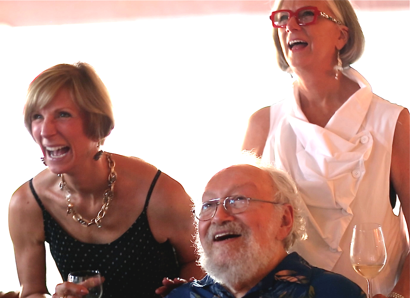 Harold enjoys the video with sisters-in-law Ruth Thompson from Carmel and Beth Black from Orlando