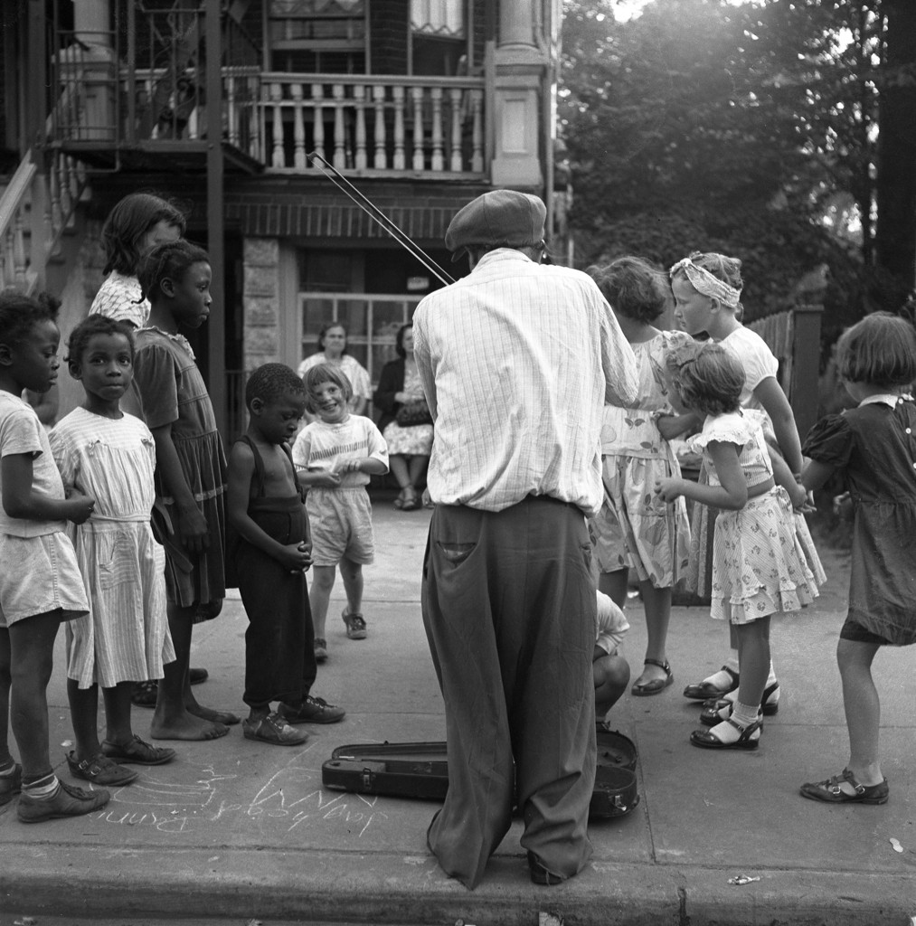 Children with fiddler in Brooklyn, 1949