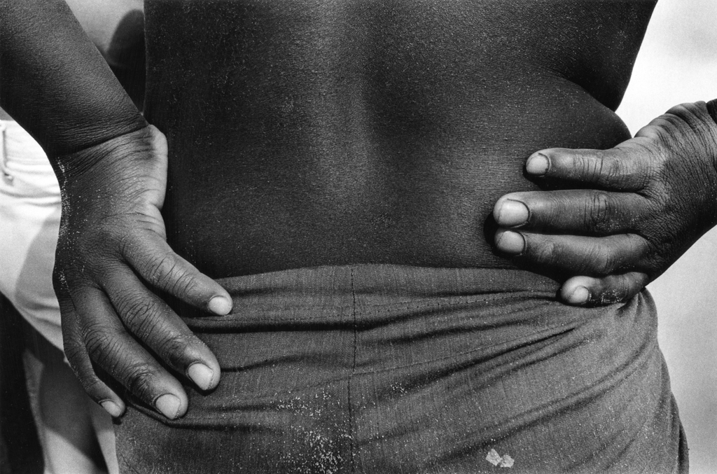 Hands on back,  Coney Island, 1974