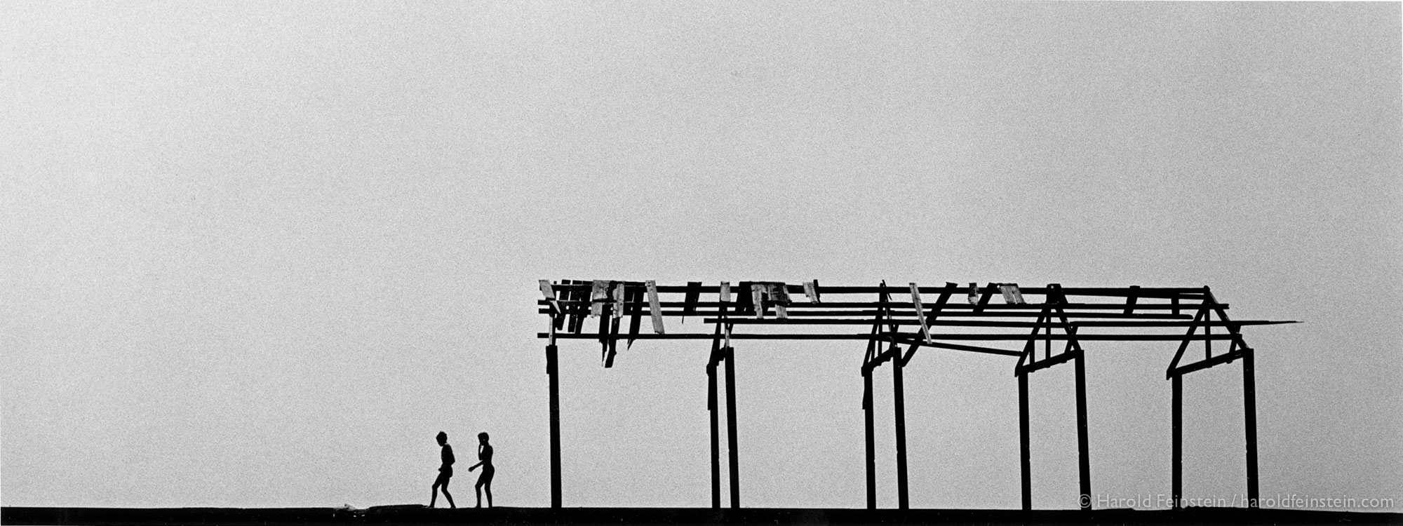Two boys on pier, 1950, the first print I ever sold was purchased by Edward Steichen for the Mumseum of Modern Art. I was nineteen